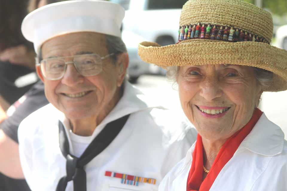 Bruno Talevi, a World War II midshipman and retired Oneonta accountant, and wife Vera never miss Cooperstown's Memorial Day commemoration, and were there this morning. (Jim Kevlin/allotsego.com)