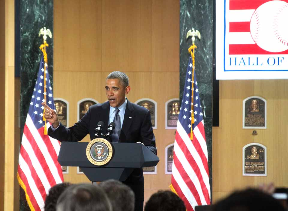 President Obama addresses a packed Hall of Plaques at 3:55 this afternoon, where he mentioned Cooperstown a half-dozen times during a nationally televised speech launching an initiatives to attract a million tourists from overseas annually by 1920.  "You can't buy that kind of publicity," a local tourism advocate observed while leaving. (Jim Kevlin/allotsego.com)