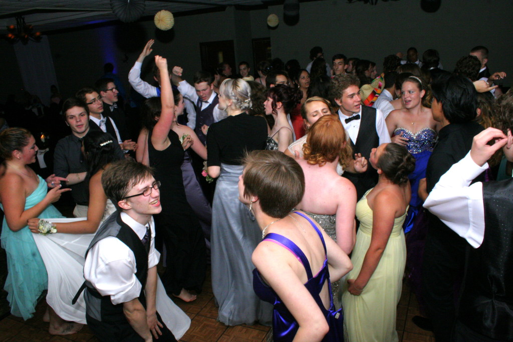 OHS seniors Kevin Hait, Abby Kahl, front,  and others enjoyed a night of food and dancing at the Holiday Inn on Southside in Oneonta who hosted the event on Thursday night.