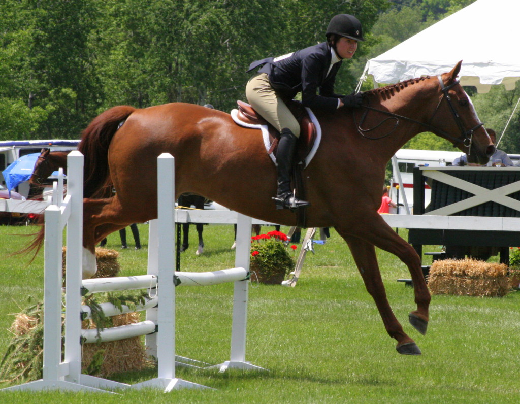 Taylor Twombly, Oneonta, on her horse Dominator during one of her runs on Sunday afternoon.