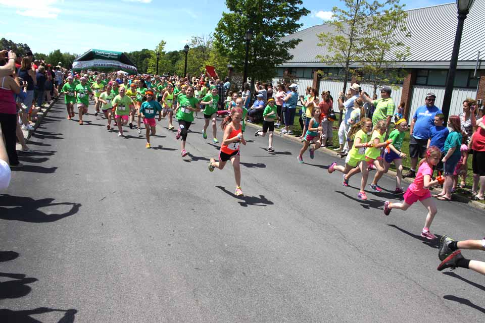 ...and they're off on the 5K race around Cooperstown