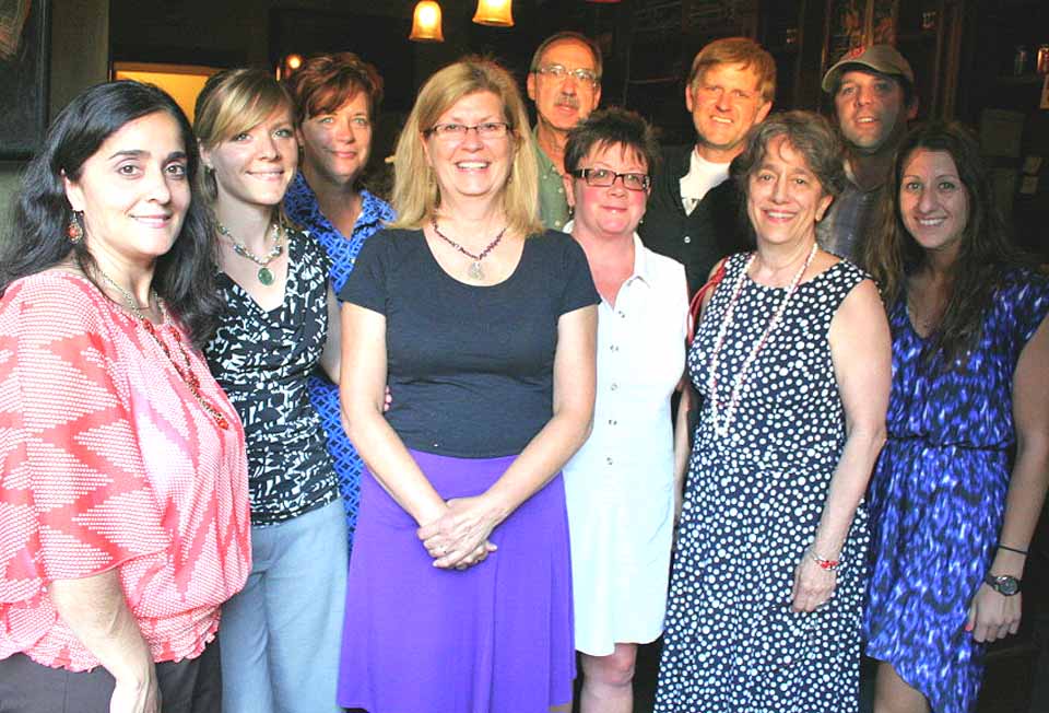 Destination Oneonta, a week and a day old, gathered for its first mixer last evening in the Oneonta Theatre. Members of the new board are, from left, Louisa Montanti, manager, Southside Mall; Kirsten Oehl, Hartwick College; Colleen Brannan, special assistant to the president, SUNY Oneonta; Nancy Scanlon, Scanlon Homes; Bob Brzozowski, executive director, Greater Oneonta Historical Society; Rachel Jessup, Oneonta manager, Bank of Cooperstown; Wayne Carrington, B Side Ballroom; Sophie Richardson, entrepreneur; Tim Masterjohn, Red Caboose proprietor, and Ashley Camarata, Hampton Inn manager.  Destination Oneonta formed Wednesday, July 3, by the Main Street Oneonta board, which changed its name and transformed its vision to encompass Greater Oneonta.  (Ian Austin/allotsego.com)