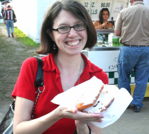 Reporter Libby Cudmore, allotsego.com's Fair Foodie, prepares to dive into a Deep-Fried Pop Tart.  (Chris Thorington for allotsego.com)