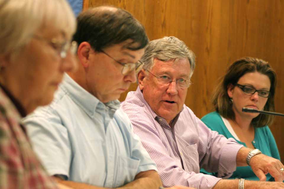 Responding to calls at Tuesday's Common Council meeting for an expanded search committee recruiting the next city manager, Mayor Miller asks for a delay until City Hall's recruiter, Nick Marra, can attend.   Others, from left, are Council members Madolyn O. Palmer, City Clerk Douglas Kendall and interim City Manager Meg Hungerford.  (Ian Austin/allotsego.com)