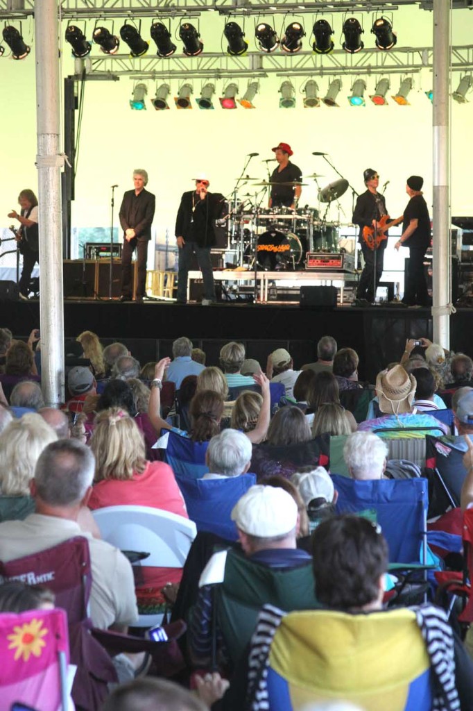 More than 3,000 fans – perhaps many more: the count wasn't final – swayed and cheered under the tent in Oneonta's Damaschke Field this evening as Three Dog Night performed "Mama Told Me Not To Come," "One," "Joy to the World" and others of their big hits from the '70s. Oneonta Outlaws owner Gary Laing was elated by the turnout; the concert benefits the hometown baseball team. (Jim Kevlin/allotsego.com)
