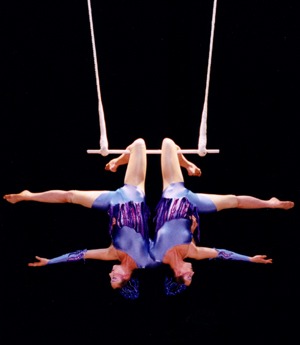 Nimble Arts Circus acrobats perform a "kneehang"
