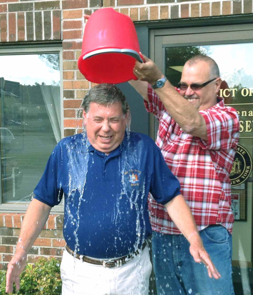 Does DJ Chuck D'Imperio seem just a bit too cheerful, dumping a bucket of ice water on his representative in the state Senate? 