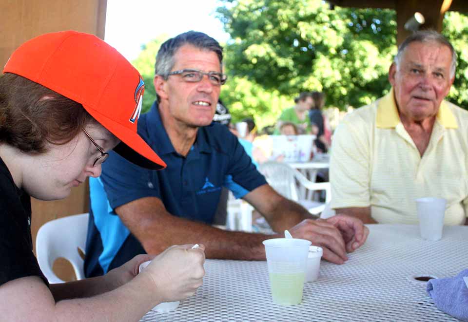 Recently minted Hall of Famer Bobby Cox, the former Atlanta Braves manager, is at Pathfinder Village in Edmeston at this hour. Here, he chats with Pathfinder resident Linda McCord and Pathfinder President Paul Landers. Cox is back in Baseball Country to host the 32nd Annual Otesaga Seniors Open & Pro-Am Golf Tournament, which begins tomorrow at the Leatherstocking Golf Course and benefits Pathfinder and the Hall of Fame's scholarship fund. (Jim Kevlin/allotsego.com)