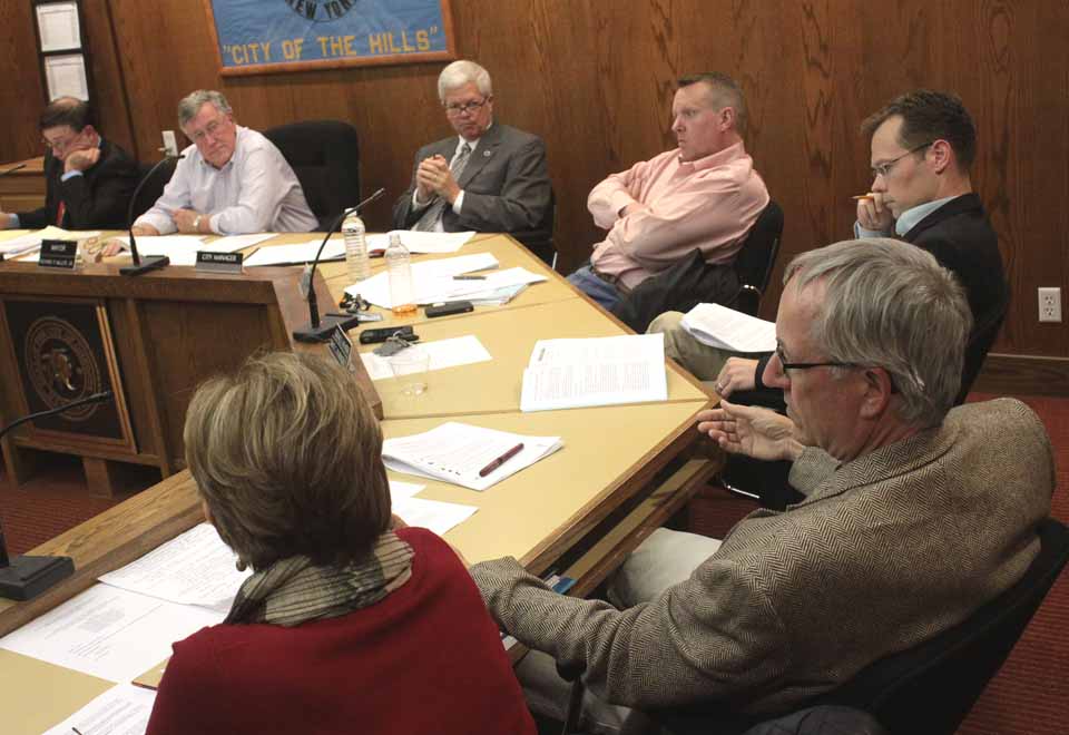 As expressions indicate, Common Council spent 90 rancorous minutes this evening debating Charter Review Commission recommendations, deciding few changes in procedures were needed. From left, are City Clerk Doug Kendall, Mayor Miller, and Council members Mike Lynch, David Rissberger, Larry Malone and Maureen Hennessy. (Ian Austin/allotsego.com)