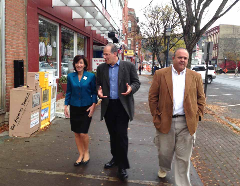 Kathy Hochul, Democratic candidate for lieutenant on Governor Cuomo's ticket, is briefed this morning by Cooperstown Mayor Katz during a tour of the downtown.  At right is Richard Abbate, the county Democratic chair.  Hochul is a congresswoman from western New York and a former Erie County clerk.  This is her second visit to Otsego County:  She keynoted the annual Jedediah Peck Democratic Dinner in September at the Country Inn & Suites, Hartwick Seminary.