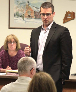 County Treasurer Dan Crowell, the county board's budget officer, outlines the 2015 spending plan at last Thursday's work session.  Behind him is Kathy Clark, R-Otego, county board chair.  (Ian Austin/allotsego.com)