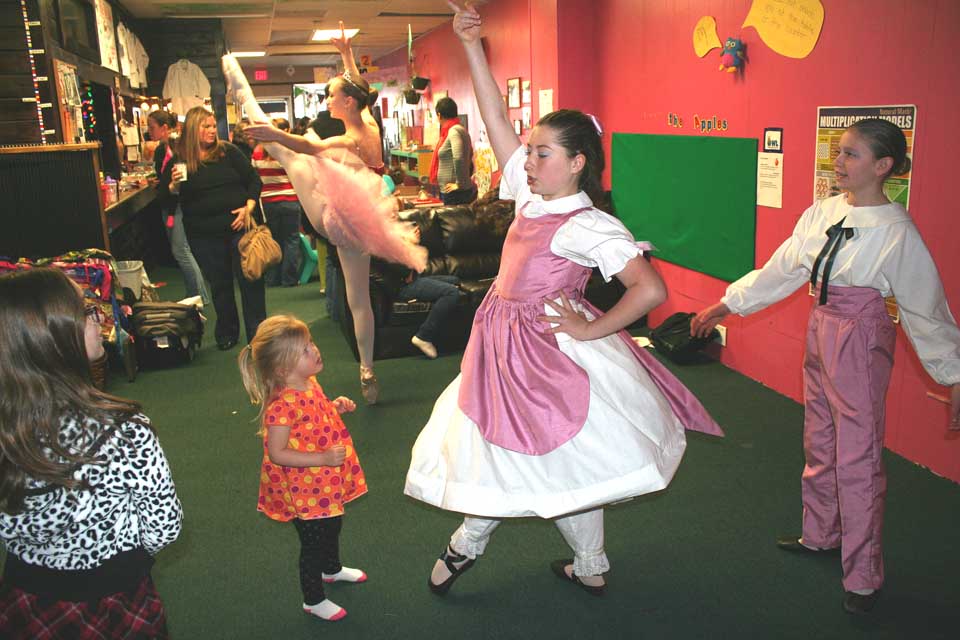 Christmas was everywhere this morning in Oneonta. Here, Clara (Sadie Tucker) wows youngsters at the OWL's Nest with a preview to Decker Dance Company's "The Nutcracker," to be performed next weekend at SUNY Oneonta's Goodrich Theater. The Sugar Plum Fair (Rose Wake, behind), and Clara's brother Fritz (Grace Craig). The dancers were Oneontans. (Jim Kevlin/allotsego.com)