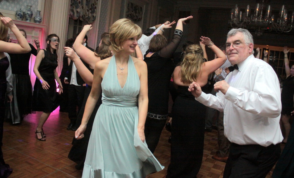 Roger Davidson, right, and his wife Maureen owners of Council Rock Brewry dance at the PTA Masquerade at the Otesaga Hotel on Saturday night. Revelers were treated to an exclusive American Farmhouse 5 Brew Ale, which was donated for the event by the Davidsons exclusively for the event.