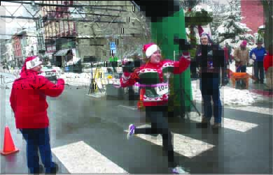 The fastest female, Melissa Swislosky, Mount Upton, finishes the Ugly Sweater 5K in 27:24; Oneonta’s Kyle Breier took top honors at 25:41. (The Freeman's Journal) 