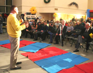 U.S. Rep. Chris Gibson, R-Kinderhook, addresses an Oneonta crowd at a New Year's Eve commemoration of former Mayor Miller at Foothills.  (allotsego.com photo)