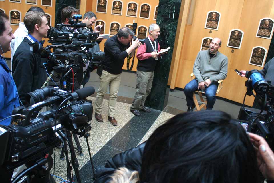 JohnSmoltz, the former Atlanta Brave who is in this year's four-player Induction Class at the Baseball Hall of Fame, is facing a phalanx of photographers and reporters at this hour in the Hall of Plaque as he undergoes his pre-Induction orientation.  Houston Astro Craig Biggio went through orientation last week, which leaves Randy Johnson and Pedro Martinez to round out the class.  (JIm Kevlin/allotsego.com)