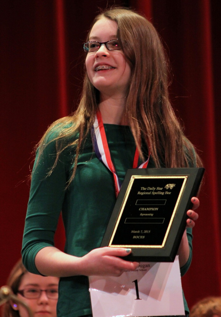 Monica Dugan, Morris, with her first place award at the conclusion of 13th Annual Regional Spelling Bee at was held in Goodrich Theater on morning. She will be representing our region in Washington D.C when she competes in the Scribbs National Spelling Bee Contest. "I like the challenge of spelling." she said. "At first I was studying an hour a day, but for the last week I have been studying 5 hours a day." (Ian Austin/ allotsego.com)