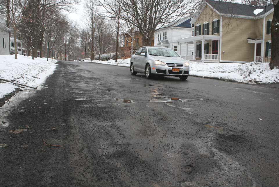 The block of Delaware Street between Elm and Beaver, a major access to Bassett Hospital, is in line for a resurfacing in the next year.  (Jim Kevlin/allotsego.com)