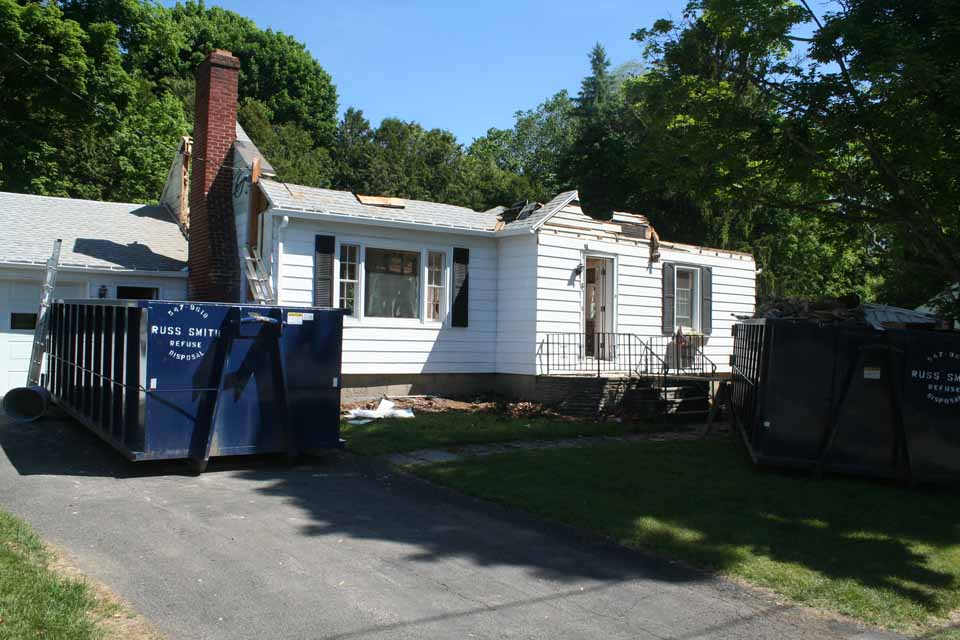 Drive by 8 Walnut St., Cooperstown, and what's going on may look like a demolition. Actually, said Josh Edmonds, partner in Simple Integrity, the contracting firm, what's actually going on is an extensive renovation. When complete, the home will be the most energy efficient in the village, he said. The owner of the property is Peter Regan. (Jim Kevlin/allotsego.com)