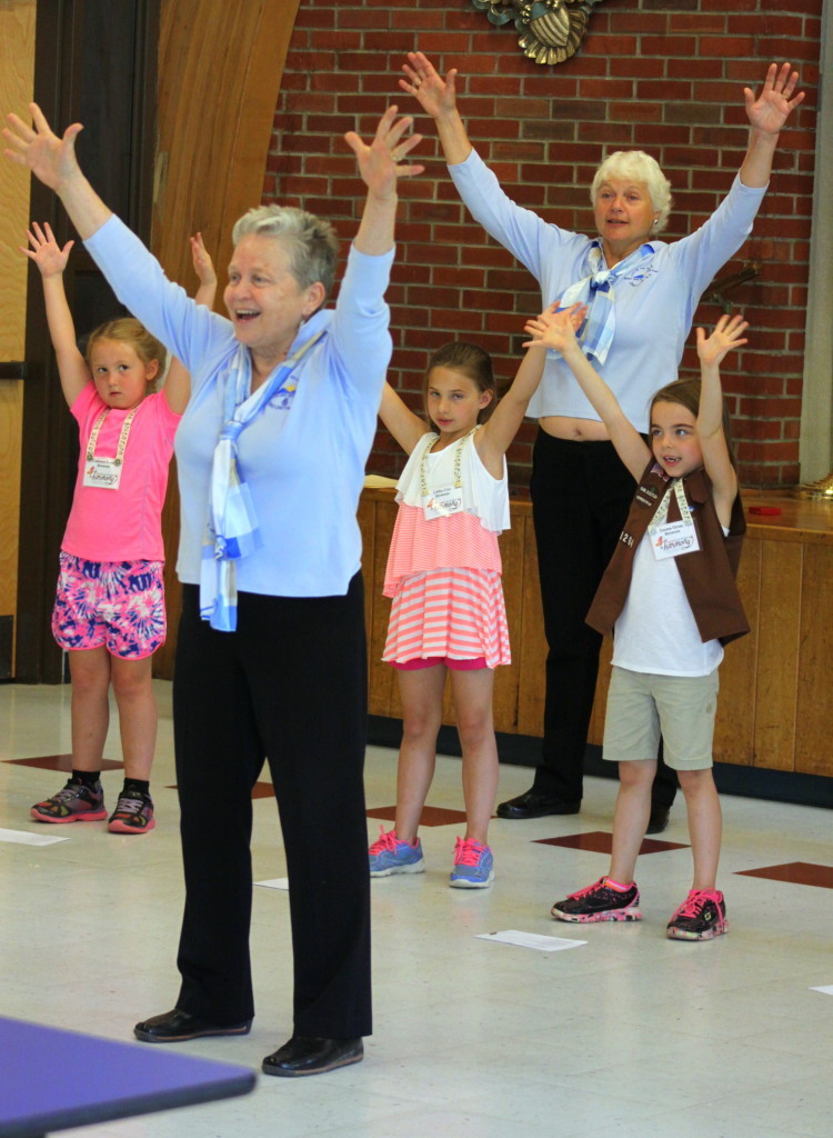 The local chapter of The Sweet Adelines are working with area Girl Scouts to help them earn their Young Women In Harmoney Activity patches.  Threes groups of girls; Daiseys, Brownies and Girl Scouts, met with The Sweet Adelines at Valleyview School on Saturday morning where they learned about harmonies, rounds, duets, trios, music recognition and more. Here, Linda Allen, front, Oneonta, and Betty Bennett, Oneonta, lead Candence Coren, Libby Cox and Emma Gross of Laurens in a dance routine. (Ian Austin/allotsego.com)