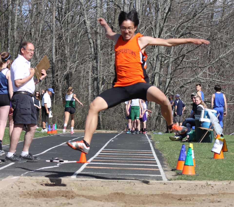 Johnny Zhang of Cooperstown in the Boys succeeds his Long Jump.