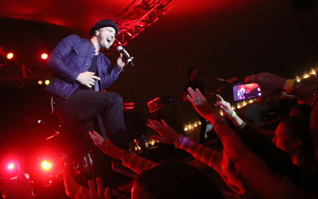 Despite ankle deep mud - even under the tent - Rock and Roll revelers came out in droves to hear Gavin DeGraw play at the Hospice Celebrity Party this evening at the 6th Ward Booster Club. (Ian Austin/allotsego.com)