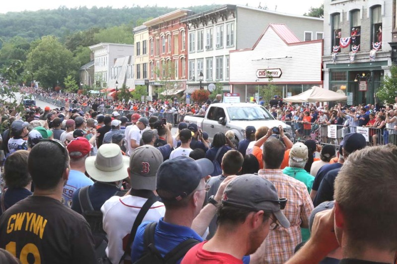 A sea of people filled Main Street for Hall of Fame Weekend’s Parade of Legends, an hour-long cavalcade that began at 6 p.m. and headed from the fire hall down Main Street to 25 Main where baseball’s heroes were hosted at a cocktail reception. The crowd, perhaps a record, was eight deep on each side of the street approaching the Hall. (Jim Kevlin/allotsego.com)