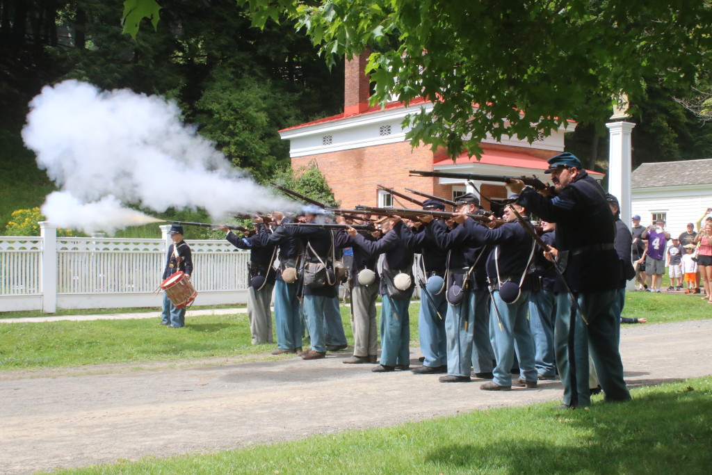 Shots rang out across Goodyear lake as Union Soldier reenactors fired on retreating Confederate soldiers who had infiltrated the Farmer's Museum village, giving onlookers an up close experience to the heat of battle during the Civil War Life event this weekend. Other events included, bayonet training, a pig roast, artifact talks, interactive Union camp and more. (Ian Austin/allotsego.com)