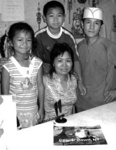 The Zhang family was photographed after their story was featured in Family Circle magazine in 2006. (allotsego.com file photo)