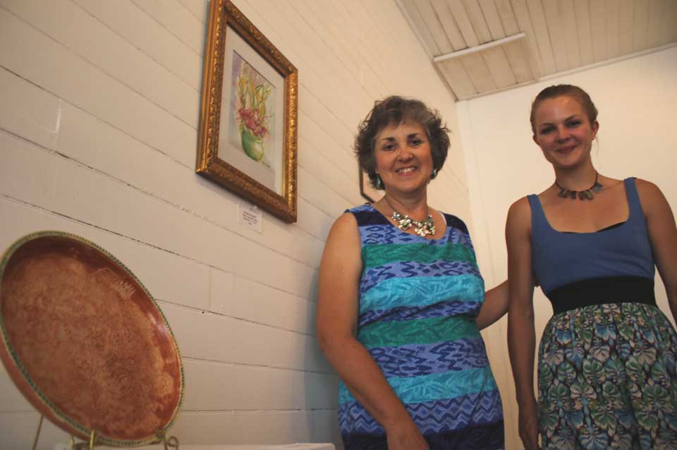 It was all in the family this evening at an opening reception at the Cherry Branch Gallery in Cherry Valley as painter Maureen Culbert, East Springfield, and her niece, Jennifer Smith, Cherry Valley, opened a joint exhibit, entitled “Waiting for the Moon,” of Maureen’s paintings and Jennifer’s sculpture. The gallery is open Wednesday-Sunday, noon-5. (Jim Kevlin/allotsego.com)