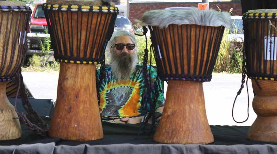 Dan Mason of Davenport (by way of Minnesota) was vending his wooden djembe drums at the City of the Hills Arts Fest; if you hurry, you can see the offerings until 6. The drums are made of local hardwoods, and based on an African model. (Jim Kevlin/AllOTSEGO.com)