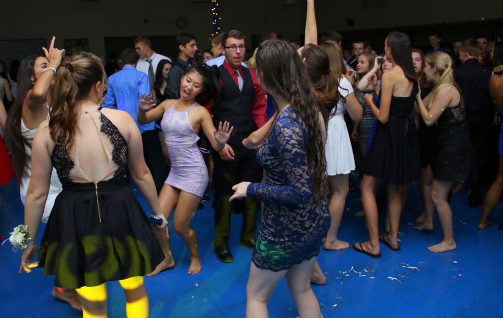 The homecoming dance was in full swing tonight At the OHS cafeteria as Natasha Kashii, Brittney Nguyen, Joe Cassassa, Autumn Aitochison, Morgyn Manzer and other students danced the night away to the sounds of Life of the Party DJ service. The dance brought a close to OHS Alumni weekend. (Ian Austin/ ALlOTSEGO.com)