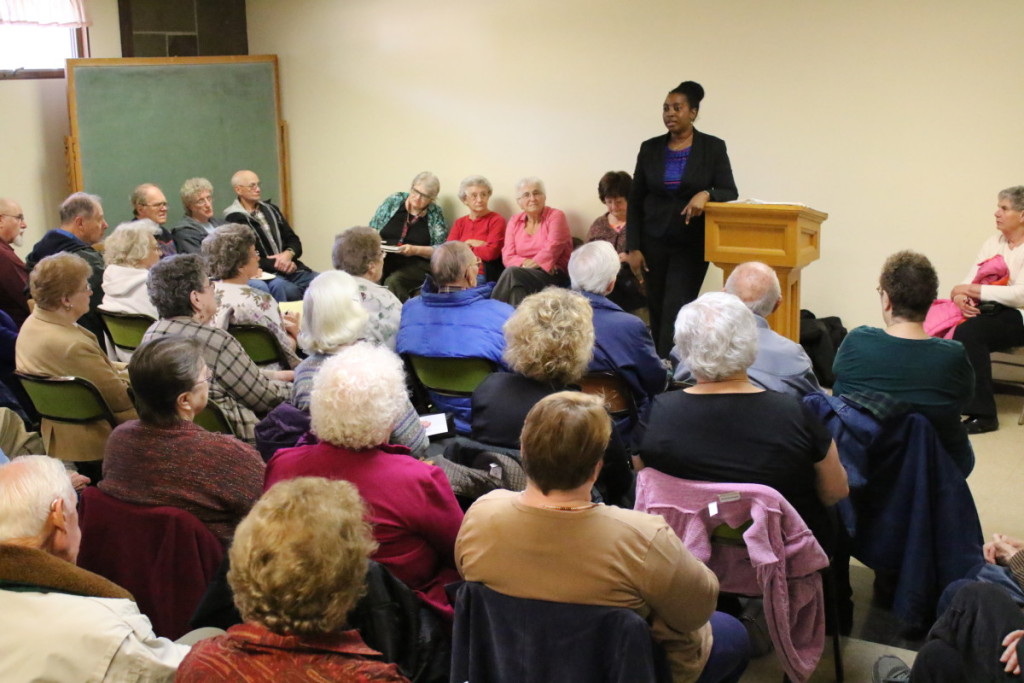 Aiesha Battle, Director of the Division of Consumer Protection addresses a record numbers of area seniors came out to attend an information forum on senior scam prevention held at Elm Park Methodist church this afternoon. Scams can pose as the IRS, prescription discount plans, to claims that they have kidnapped members of your family. Attendees were given information packets, numbers to call to report scams and sleeves for their chip credit cards to thwart pocket scanners. "The long and short of it is this;," said Battle, "Of someone is asing you for money through the mail it's a scam. If you have to pay money to get money, it's a scam." (Ian Austin/AllOTSEGO.com)