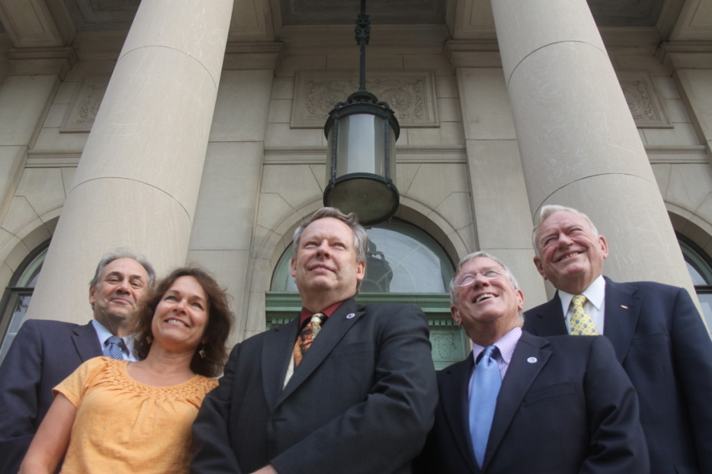 It was a proud day – Sept. 7, 2012 – when four mayors posed with Oneonta’s first city manager, Mike Long, on City Hall’s steps. From left are John Nader, Kim Muller, Long, Dick Miller and David W. Brennan. Let’s recapture that feeling.