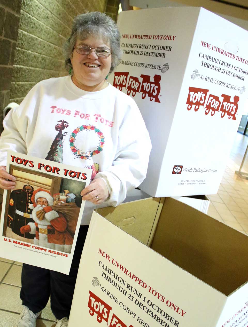Sharon Wheeler of Oneonta, a disabled Army veteran in her third day as the new Otsego-Delaware coordinator for the Marine Corps' Toys for Tots, announced at Southside Mall today that boxes are being placed at the Southside Mall, the Clark Sports Center, Tri-Town Computers and elsewhere.  If you need toys, or have a location for a box, call Sharon at 349.2737.   "We are about 3-4 weeks behind," she said. "It's been a whirlwind, but I love it!"  The toys will be given out 1-6 p.m. Tuesday, Dec. 22, at the Elks Club, 84 Chestnut St., Oneonta.  (Ian Austin/AllOTSEGO.com)