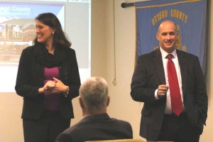 Laberge Group Vice President Ben Syden and Planning Services Manager Nicole Allen report initial findings of last month's community strategic planning exercises to the county Board of Representatives this morning. (Jim Kevlin/AllOTSEGO.com)