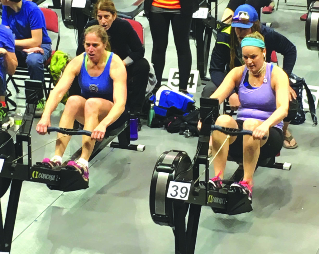 Andrea Thies, in blue, placed fourth in the World Rowing Machine Competition.