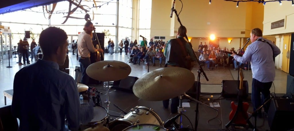 Sebastian Green, Cooperstown, Evan Jagels, Oneonta, Randy Miritello, Oneonta, and John Thompson, Oneonta, who together make up The Hop City Hellcats, get to crowd dancing at the City of the Hills Bluegrass American Music Festival, going on now at the Foothills Preforming Arts Center. Tickets are still available for the event which culminates at 8pm when the Grammy award-winning band The SteelDrivers will take the main stage. (Ian Austin/AllOTSEGO.com)