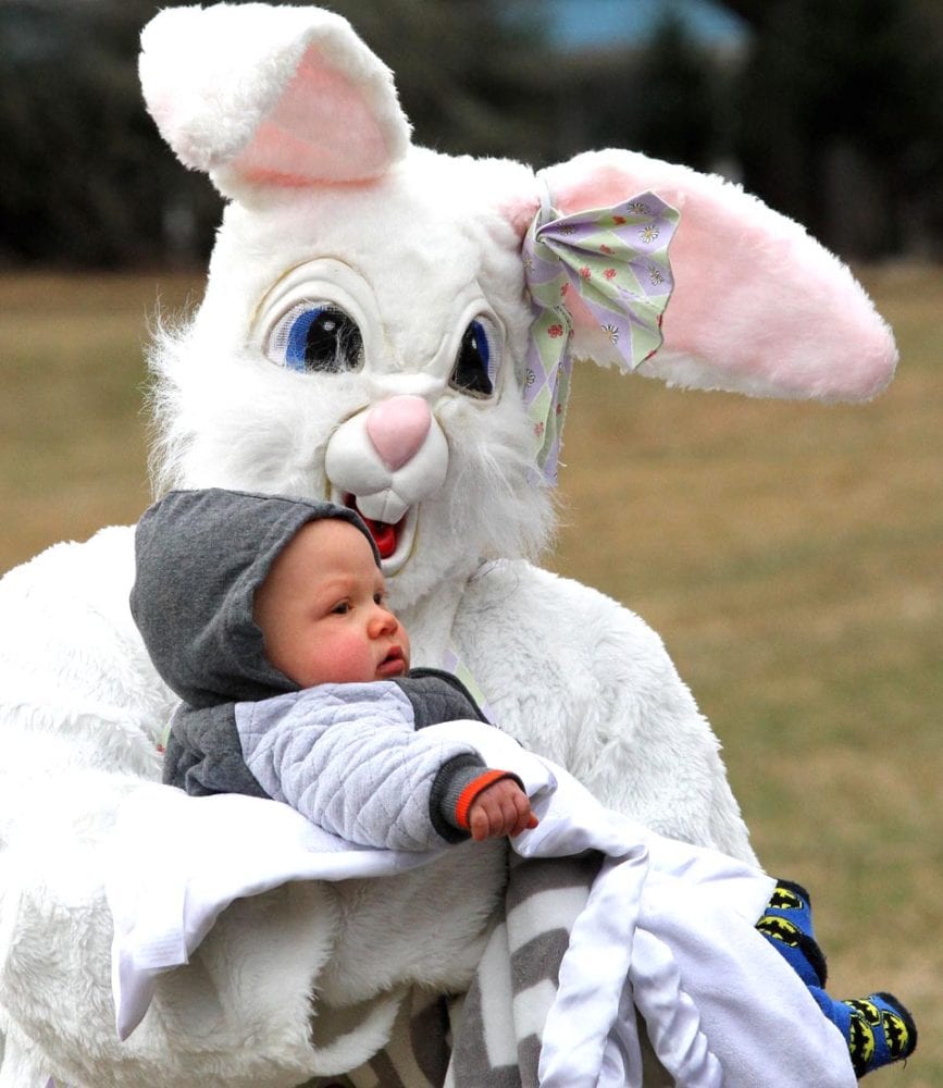 9-month old Nicolai Jacksto meets the Easter Bunny for the first time this afternoon at the Goodyear Lake Easter Egg Hunt. (Cheryl Clough/AllOTSEGO,com)