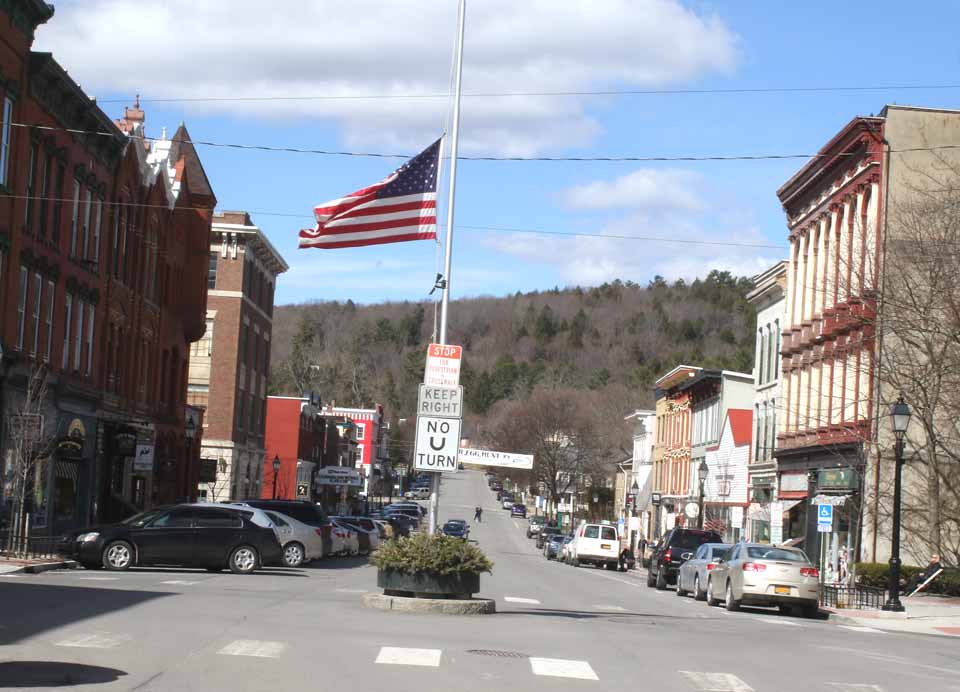 The flag at Main and Pioneer in downtown Cooperstown was lowered this morning to half-staff in remembrance of CCS Superintendent of Schools C.J. Hebert, who died in a four-wheeler accident on Sunday In Schoharie County. (AllOTSEGO.com)