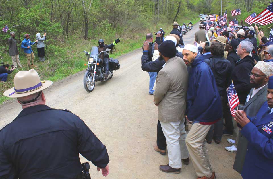 Five "American Patriots Against Jihad" motorcycles and five vehicles pass by Islamberg this afternoon, a much-feared confrontation that was over in a few seconds. (Ian Austin/AllOTSEGO.com)