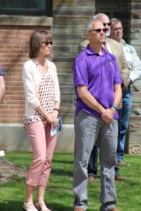 Deb and Mark Parisian, Oneonta, stand in remembrance of Ricky Parisian, during the Troop C Memorial Day service. Tomorrow will mark the 22nd anniversary of his death.