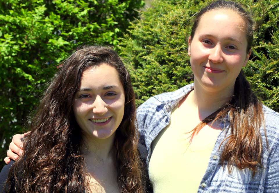 Nisha Labroo, left, is the valedictorian of the Oneonta High School Class of 2016, and Emily Louckes is salutatorian.  Both will address their classmates at commencent on Saturday, June 25.  For details on Nisha and Emily's plans, see this week's edition of Hometown Oneonta, on newsstands Wednesday afternoon.  (Ian Austin/AllOTSEGO.com)