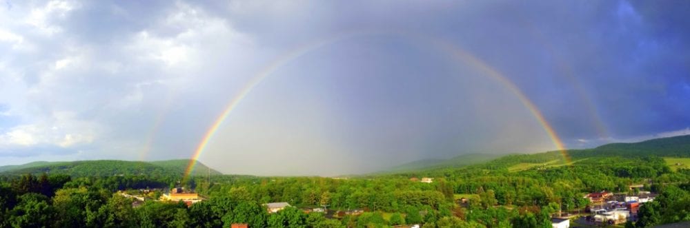 After a week of warm weather a passing storm system with heavy rains made it's way through the area, leaving behind this magnificent rainbow seen over Oneonta this evening. (Ian Austin/AllOTSEGO.com)