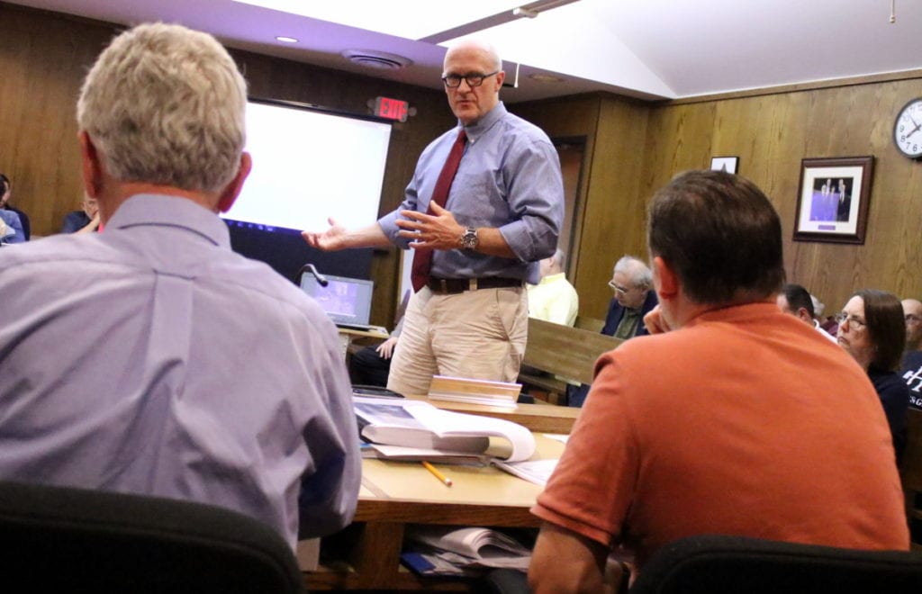 Jim Martin, senior planner and project manager for the LA Group's "Focus on the Future of Main Street" project, presents his findings to Common Council members John Rafter, Seventh Ward and Joe Ficano, Eighth Ward, at tonight's meeting. (Ian Austin/AllOTSEGO.com)
