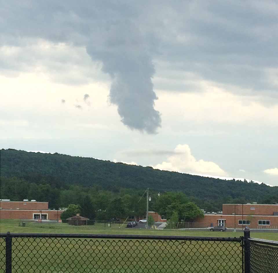 An e-correspondent sent along this photo this evening of what looks a bit like a funnel cloud descending on Cooperstown Central School at 3:22 p.m. Tuesday afternoon. Any thoughts?