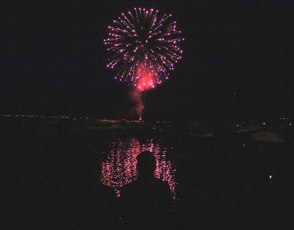 Fireworks fans watch the grand finale from Cooperstown's Lakefront Park, signalling the arrival of the Fourth of July Weekend, but not hte end of festivities. Sunday, a boat parade will pass Lakefront Park at 3 p.m. And Monday, the 102nd Springfield Parade, which draws attendees from all over the country, steps off. At noon Monday, an Independence Day Parade will process down Main Street, Oneonta, to Neahwa Park, where Hometown Fourth of July celebrations, including free music and a battle of the bands, will be topped at day's end by a fireworks display over the City of the Hills. (Jim Kevlin/AllOTSEGO.com)
