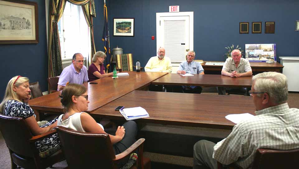 Otsego Now President/CEO Sandy Mathes, front right, and the Cooperstown Village Board discuss which CFAs to pursue this year. The comprehensive funding applications, Governor Cuomo's process for distribution $1/2 billion annual to Upstate regions are due by the end of the month; the winners are usually announced in December. Discussion focused on improvements to Railroad Avenue and the Doubleday Field parking lot. Others attendess, clockwise from Mathes, are Village Trustees Cindy Falk and Ellen Tillapaugh Kuch, Mayor Jeff Katz, Village Clerk Teri Barown, and Village Trustees Bruce Maxson, Lou Allstadt and James Dean.
