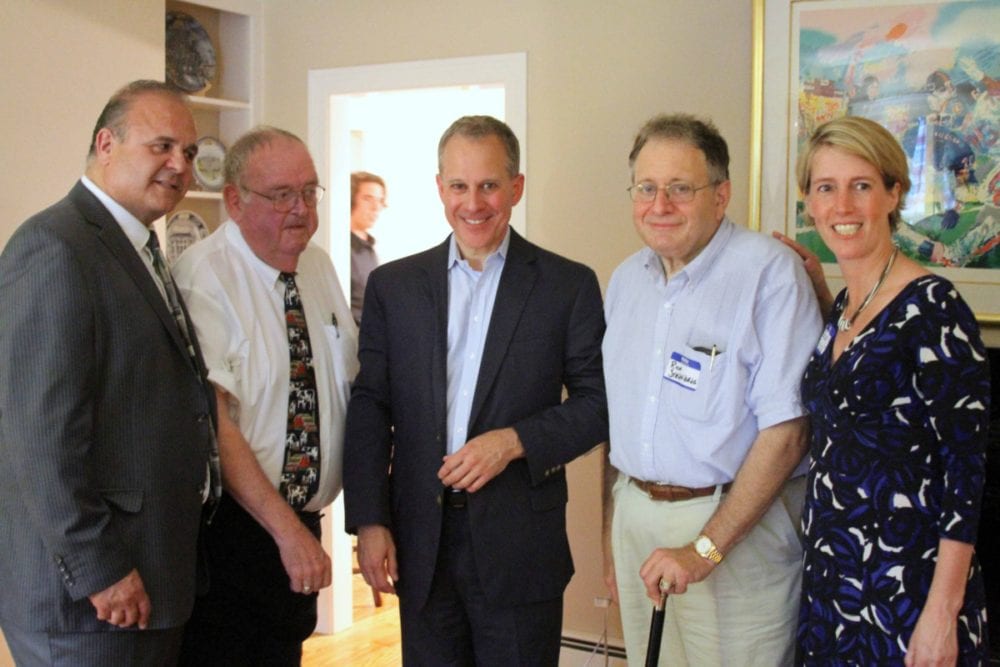 State Attorney General Eric Schneiderman is in the Cooperstown area this weekend, posing here last evening at the annual county Democratic Dinner at Village Trustee Richard Sternberg's Westridge Road home. From left are county Chairman Richard Abbate, Assemblyman Bill Magee, D-Nelson, Schneiderman, Dr. Sternberg and Zephyr Teachout, Democratic candidate for the 19th Congressional District. This afternoon at 4, Schneiderman will appear at a Glimmerglass Festival forum, discusses the current applications of "The Crucible." The operatic adaption of Arthur Miller's play is part of the festival's 2016 season.