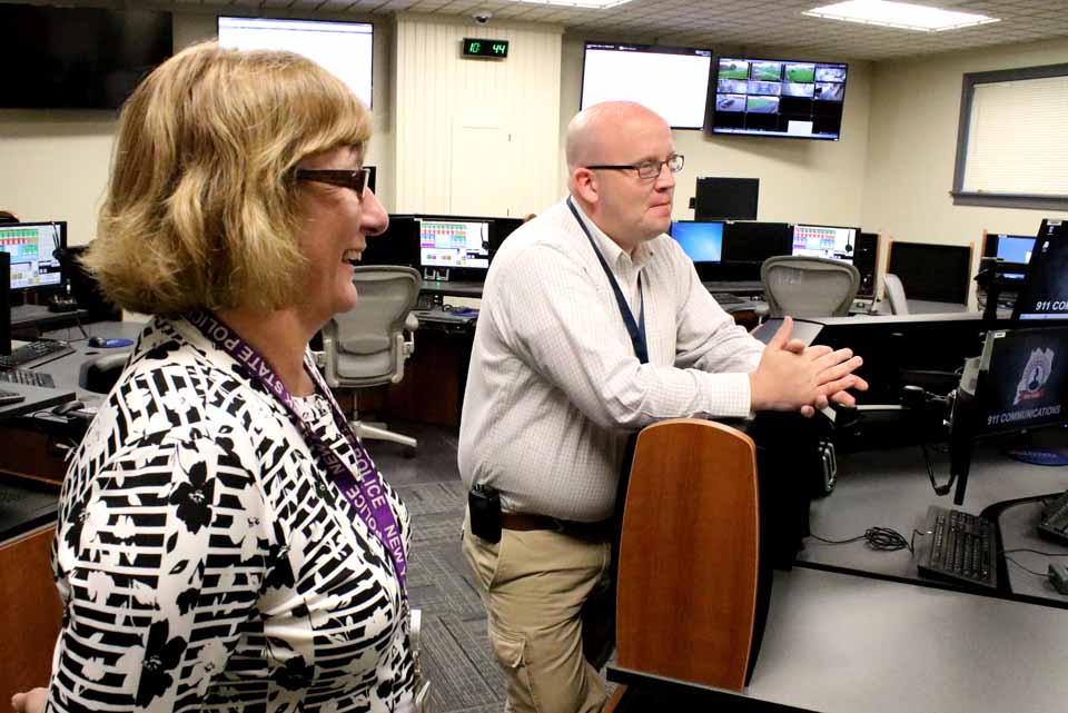 County Board Chair Kathy Clark, R-Otego, and 911 Center Director Rob O'Brien discuss the promise of the new facility when it opened May 17. (AllOTSEGO.com photo)